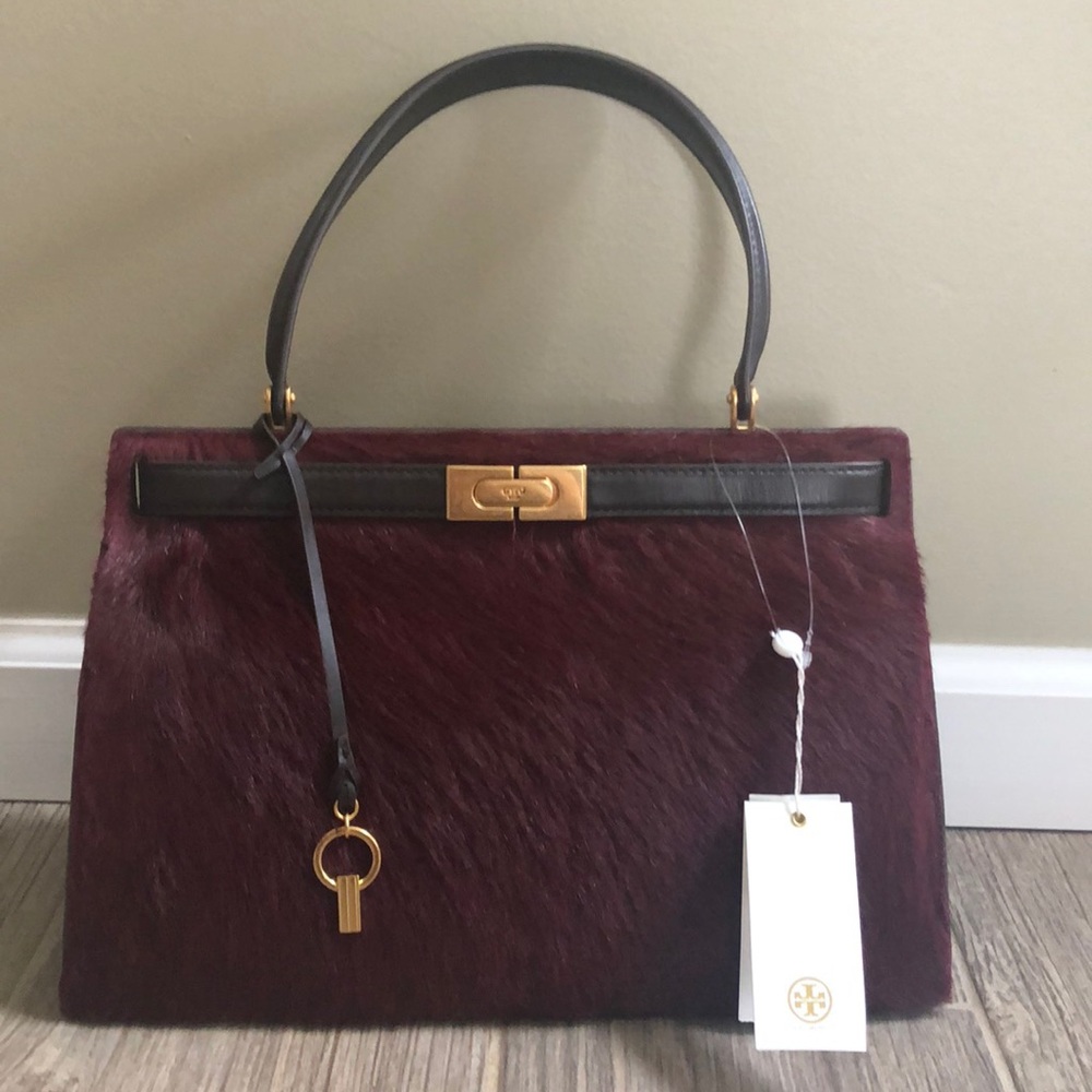 Lee Radziwill Bag in color Claret used once. Comes with dust bag & box/bag